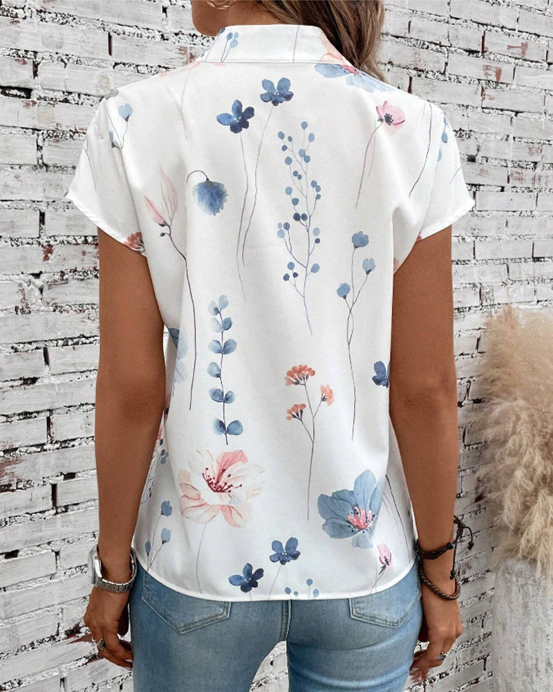 Magalie | Haut à manches courtes et col montant avec motif floral™